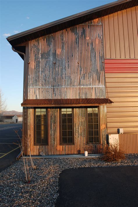 white house with metal building|homes with metal siding photos.